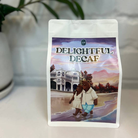 Bag of Nicaraguan decaf coffee beans described as rich, chocolatey and silky smooth, perfect for evening drinking without caffeine.